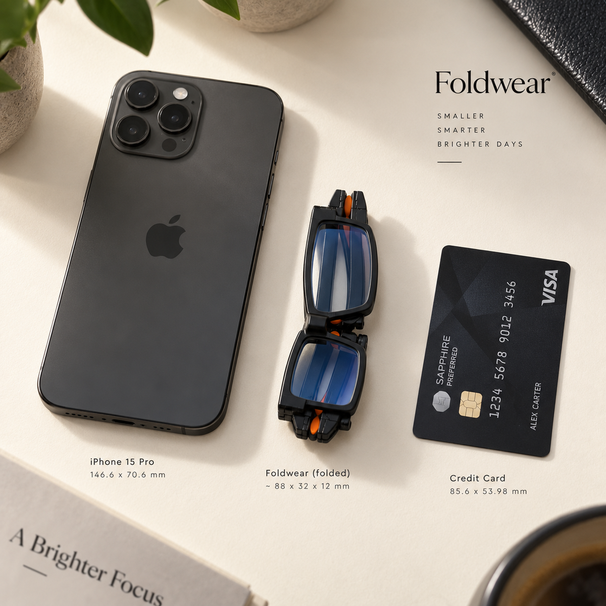 Foldwear Classic folded next to a phone and credit card for size